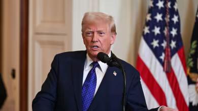 Trump defends aid federal funding freeze after White House says it rescinds order