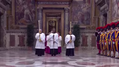Cardinals process into the Sistine Chapel to begin the conclave