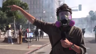 Police deploy tear gas at L.A. protest near federal building