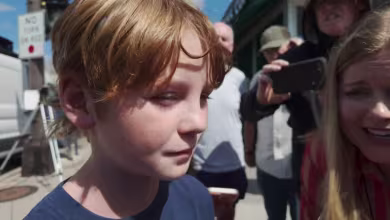 10-year-old says friend was shot laying on top of him