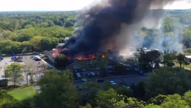 Drone video shows Michigan church on fire after shooting