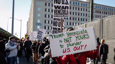 Protesters gather outside detention center where Maduro is being held