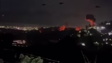 Helicopters seen flying above Caracas amid explosions