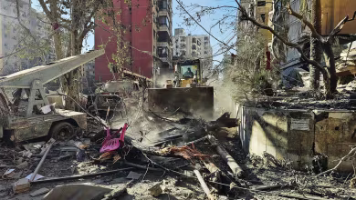 Excavators clear rubble from Beirut's embattled southern suburbs