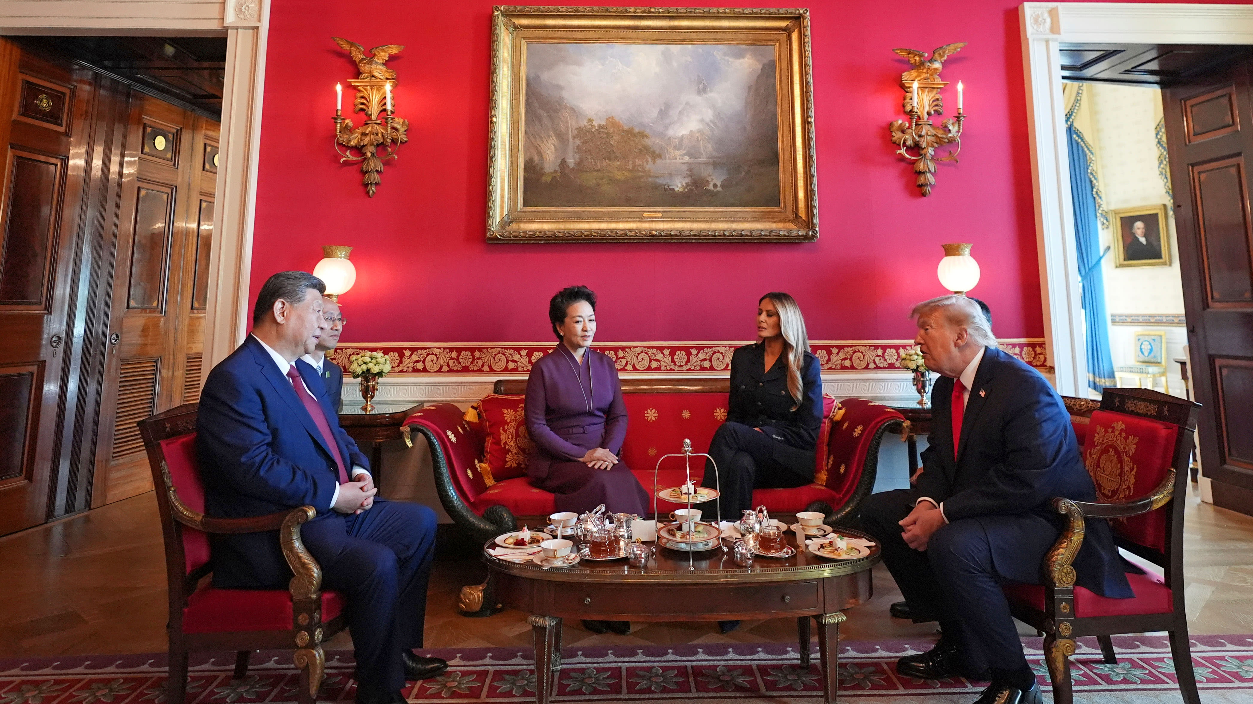 President Donald Trump and first lady Melania Trump attend a tea with China's President Xi Jinping and his wife Peng Liyuan in the Red Room of the White House, Friday, Sept. 25, 2026.