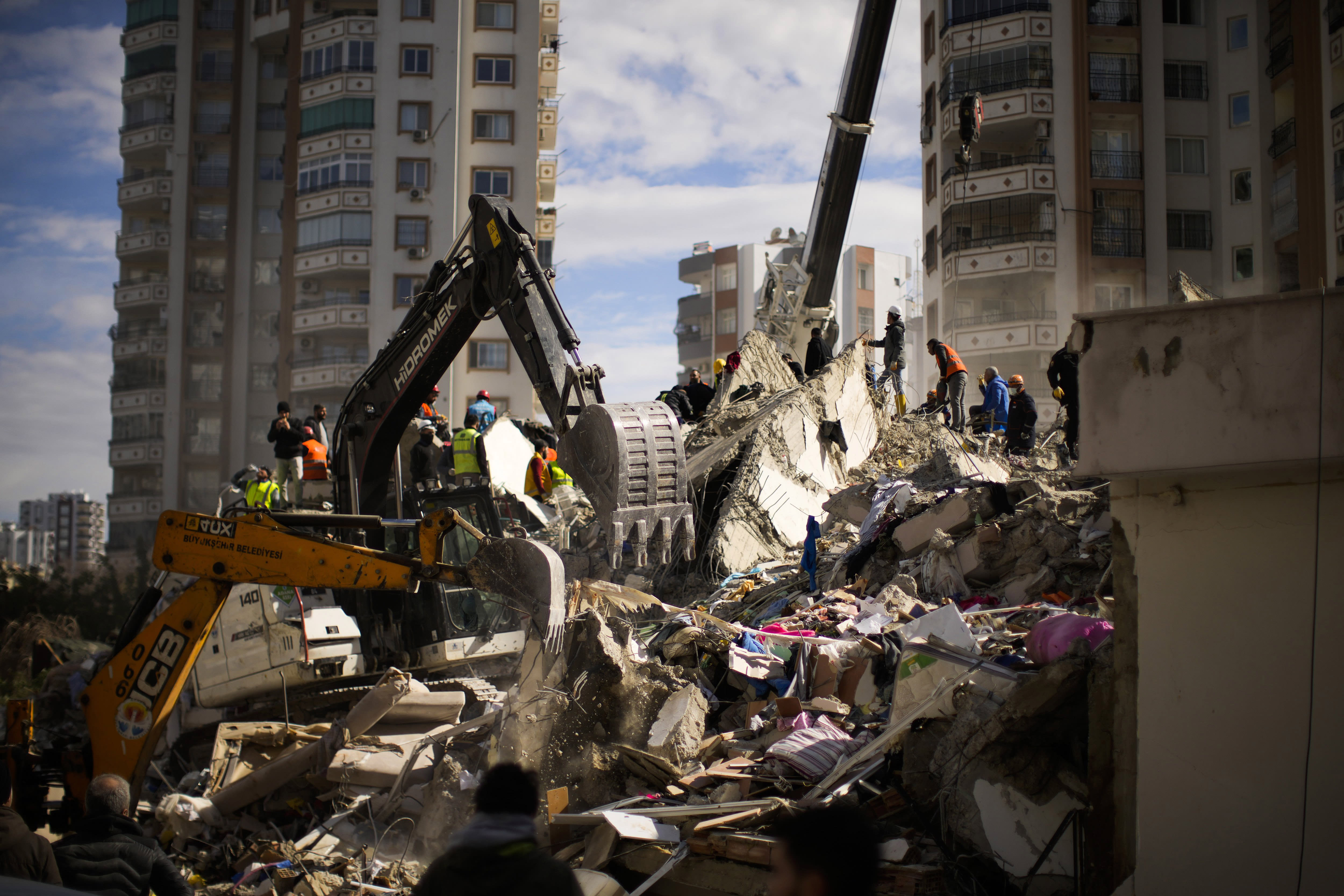 Rescuers raced Tuesday to find survivors in the rubble of thousands of buildings brought down by a powerful earthquake and multiple aftershocks that struck eastern Turkey and neighboring Syria.