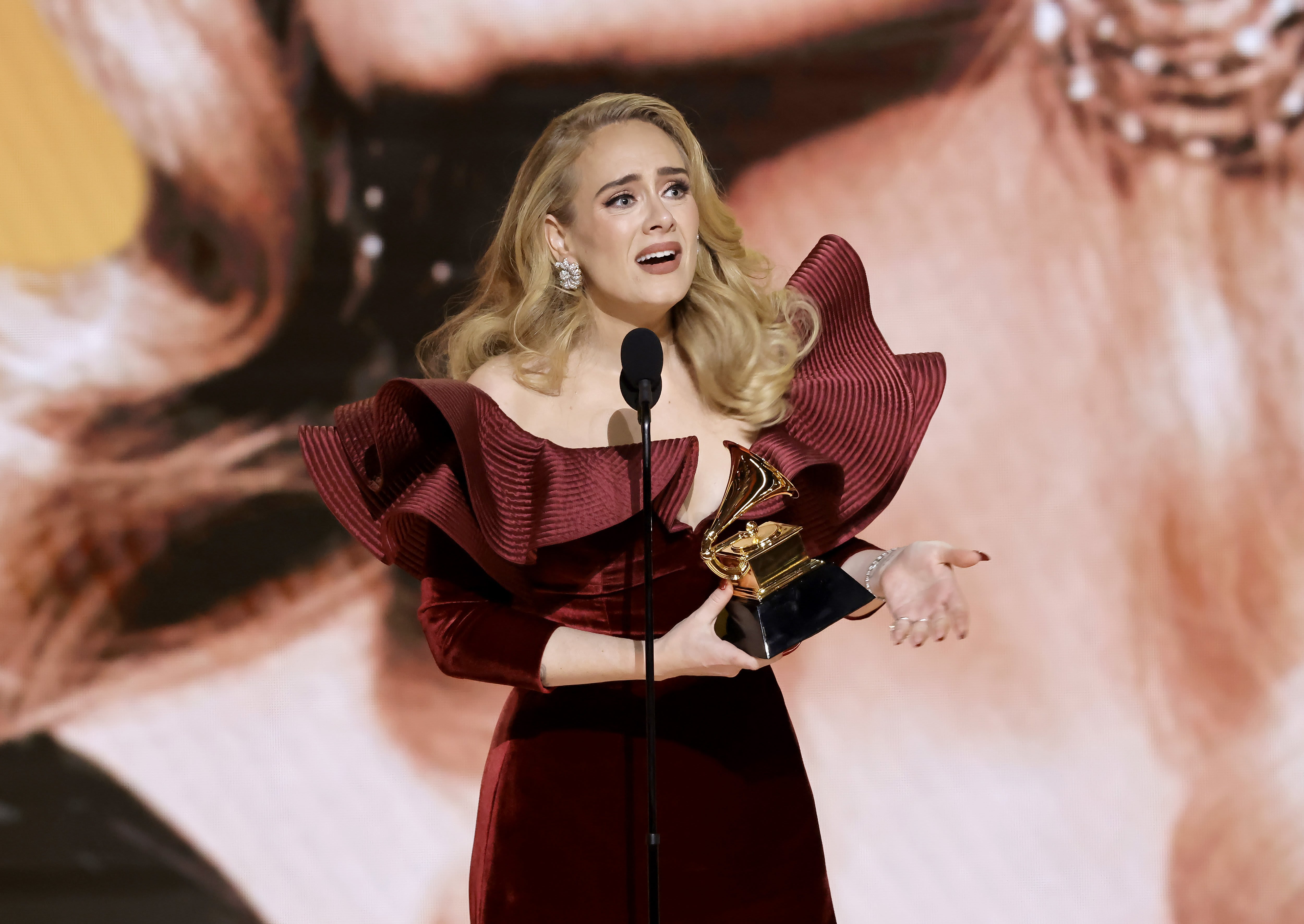 Adele accepts the Best Pop Solo Performance award. 