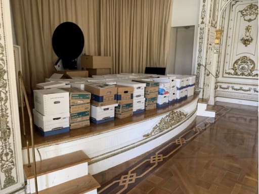 This image, contained in the indictment against former President Donald Trump, shows boxes of records being stored on the stage in the White and Gold Ballroom at Trump's Mar-a-Lago estate in Palm Beach, Fla. Trump is facing 37 felony charges related to the mishandling of classified documents according to an indictment unsealed Friday, June 9, 2023. (Justice Department via AP)