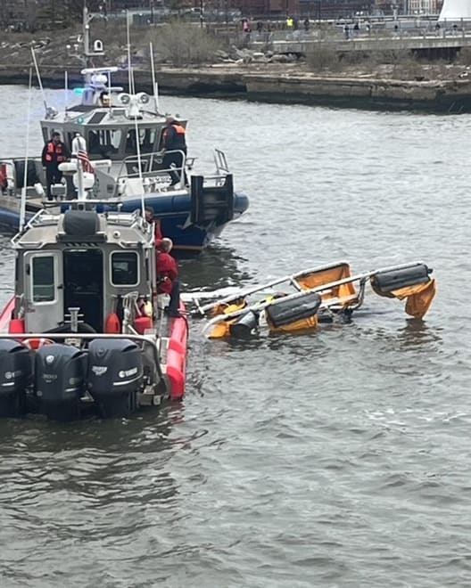 A helicopter in the Hudson River in New York on April 10, 2025.