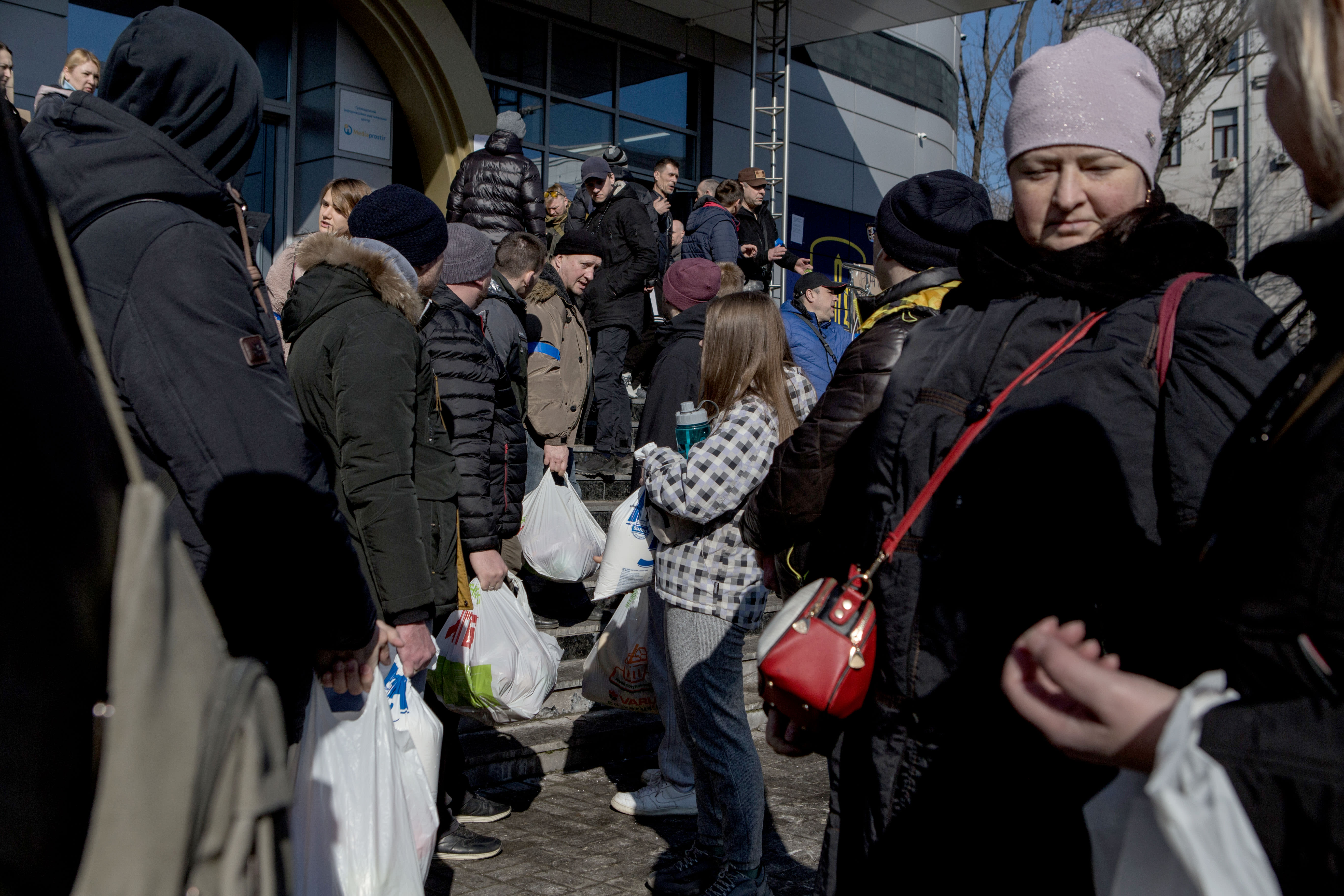 Dnipro locals prepare molotov cocktails