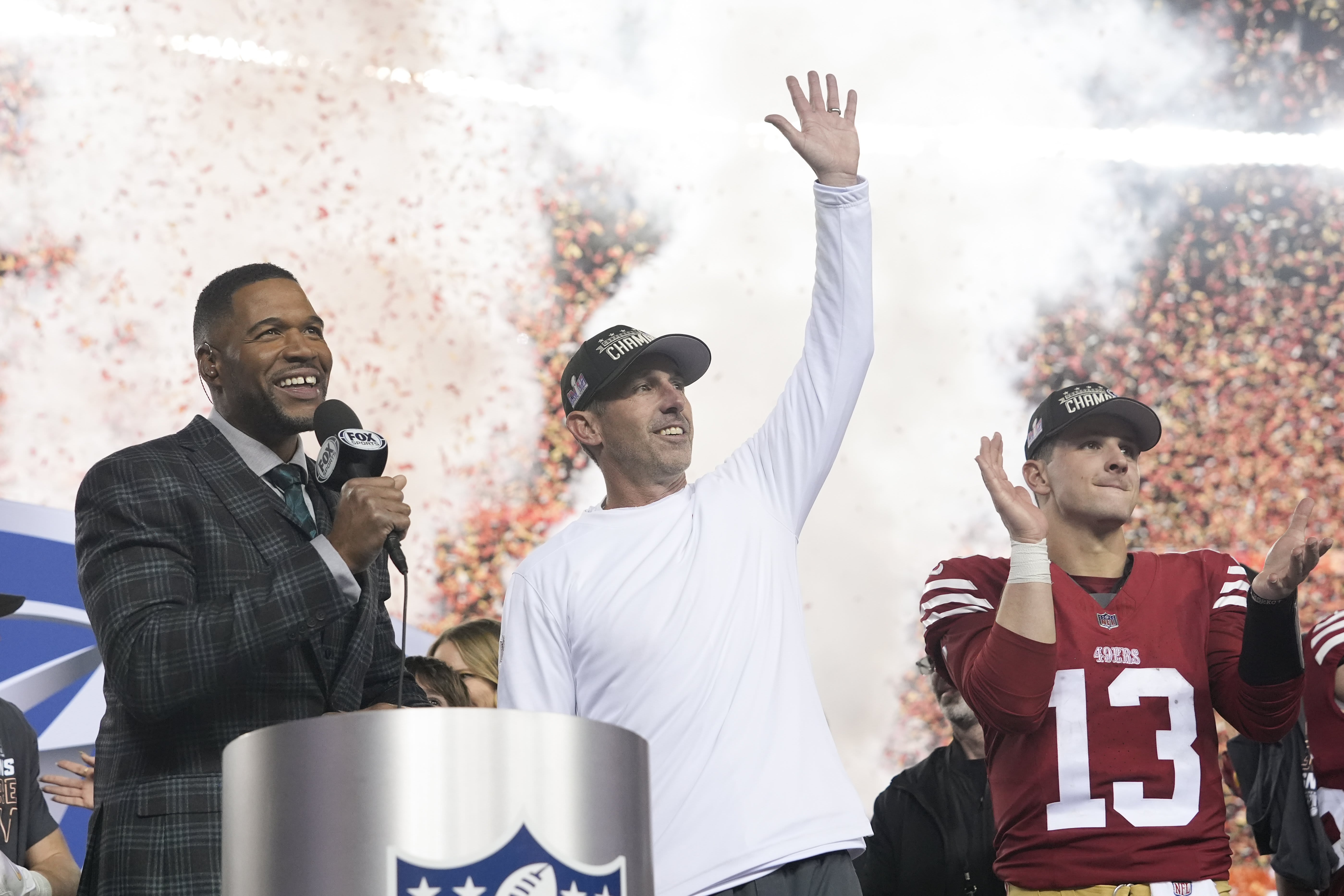 San Francisco 49ers head coach Kyle Shanahan waves after their win against the Detroit Lions in the NFC Championship NFL football game in Santa Clara, Calif., Sunday, Jan. 28, 2024.