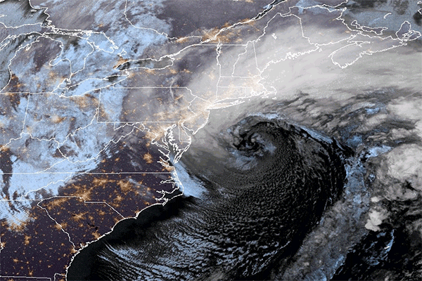 A satellite image shows a blizzard looming over the East Coast on Feb. 23, 2026.