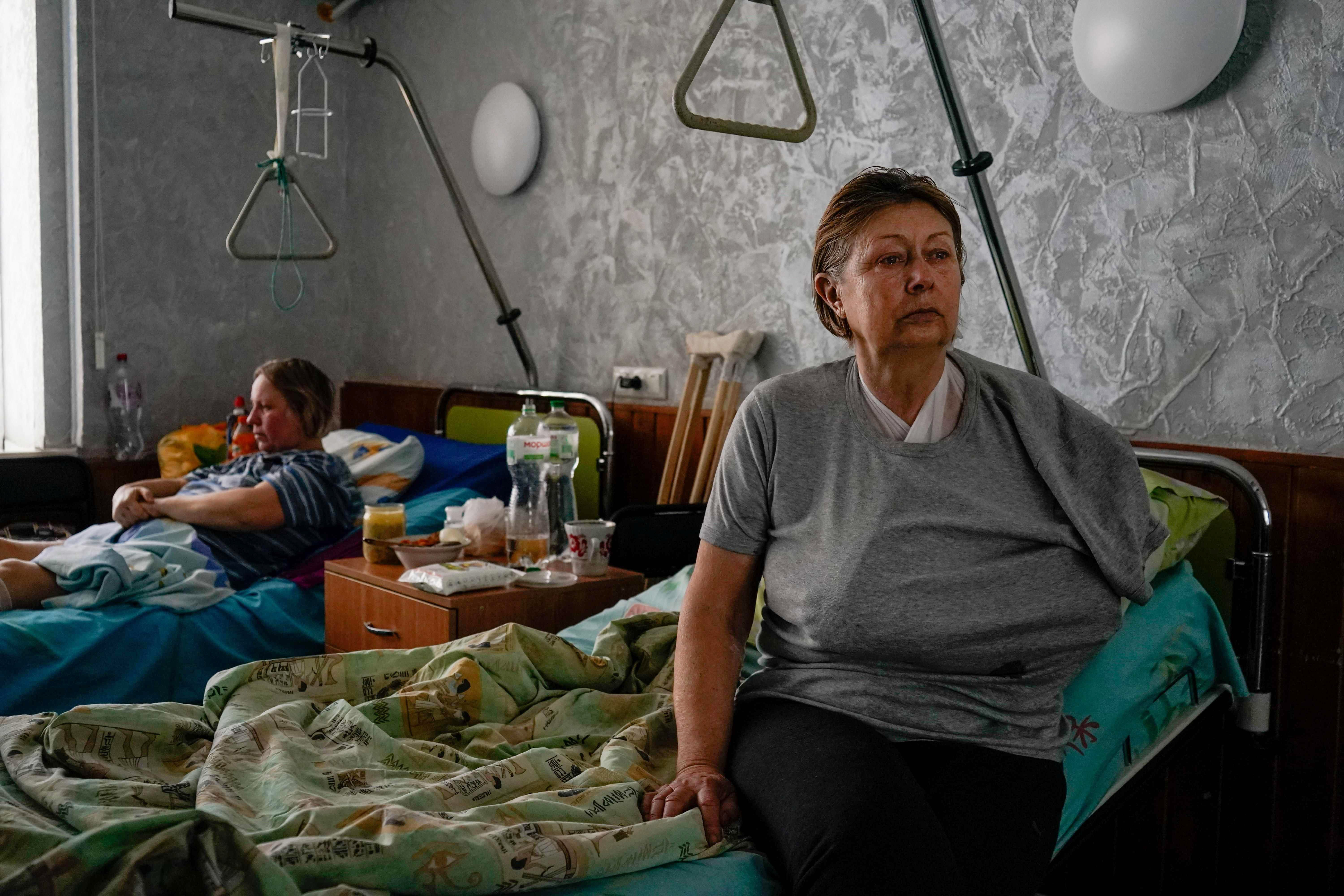 Wounded women sit on their beds in a hospital in Zaporizhzhya, Ukraine on Tuesday.