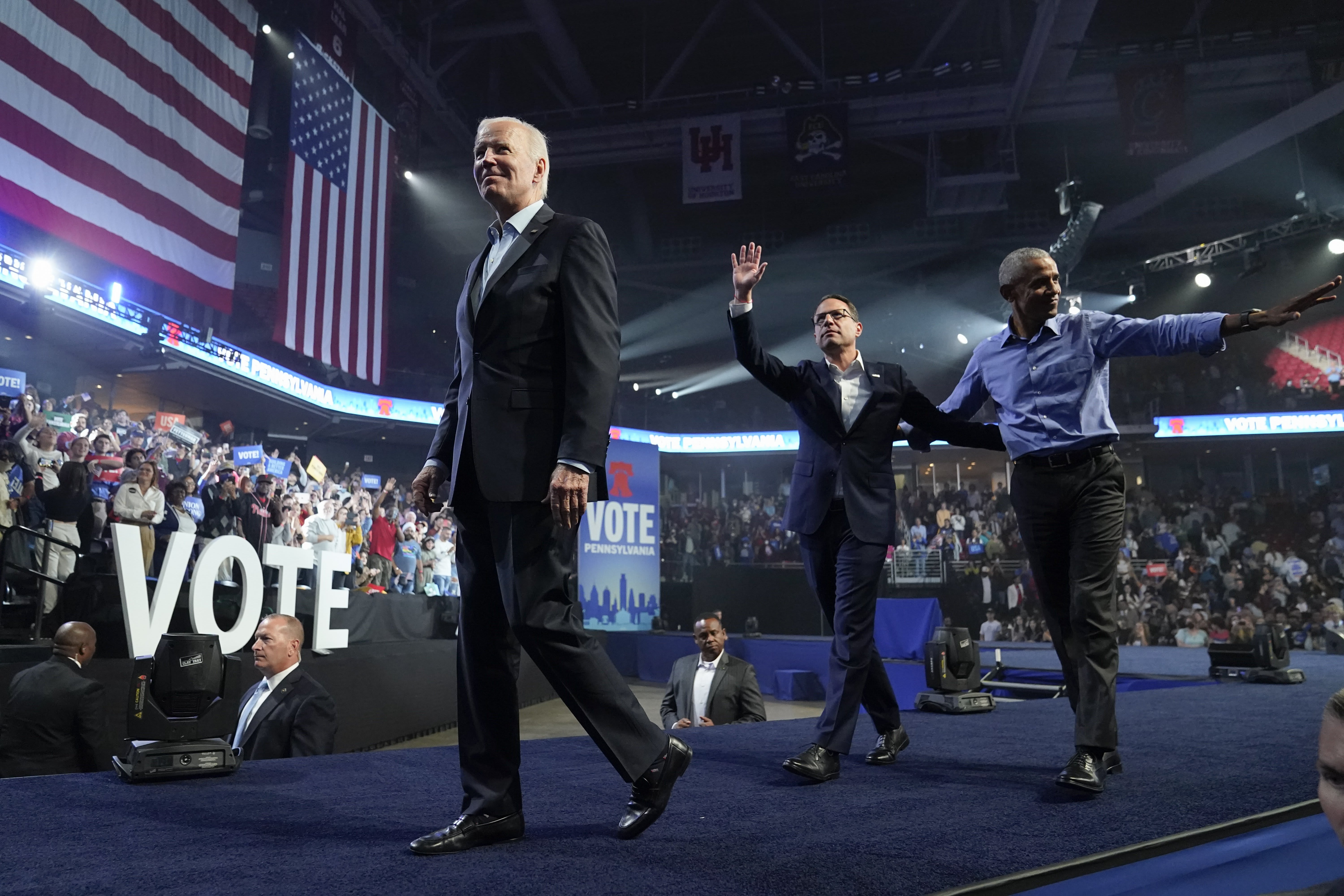 President Joe Biden leaves with former President Barack Obama and Pennsylvania's Democratic gubernatorial candidate Josh Shapiro after a campaign rally for Shapiro and Democratic Senate candidate Lt. Gov. John Fetterman, Saturday, Nov. 5, 2022, in Philadelphia.