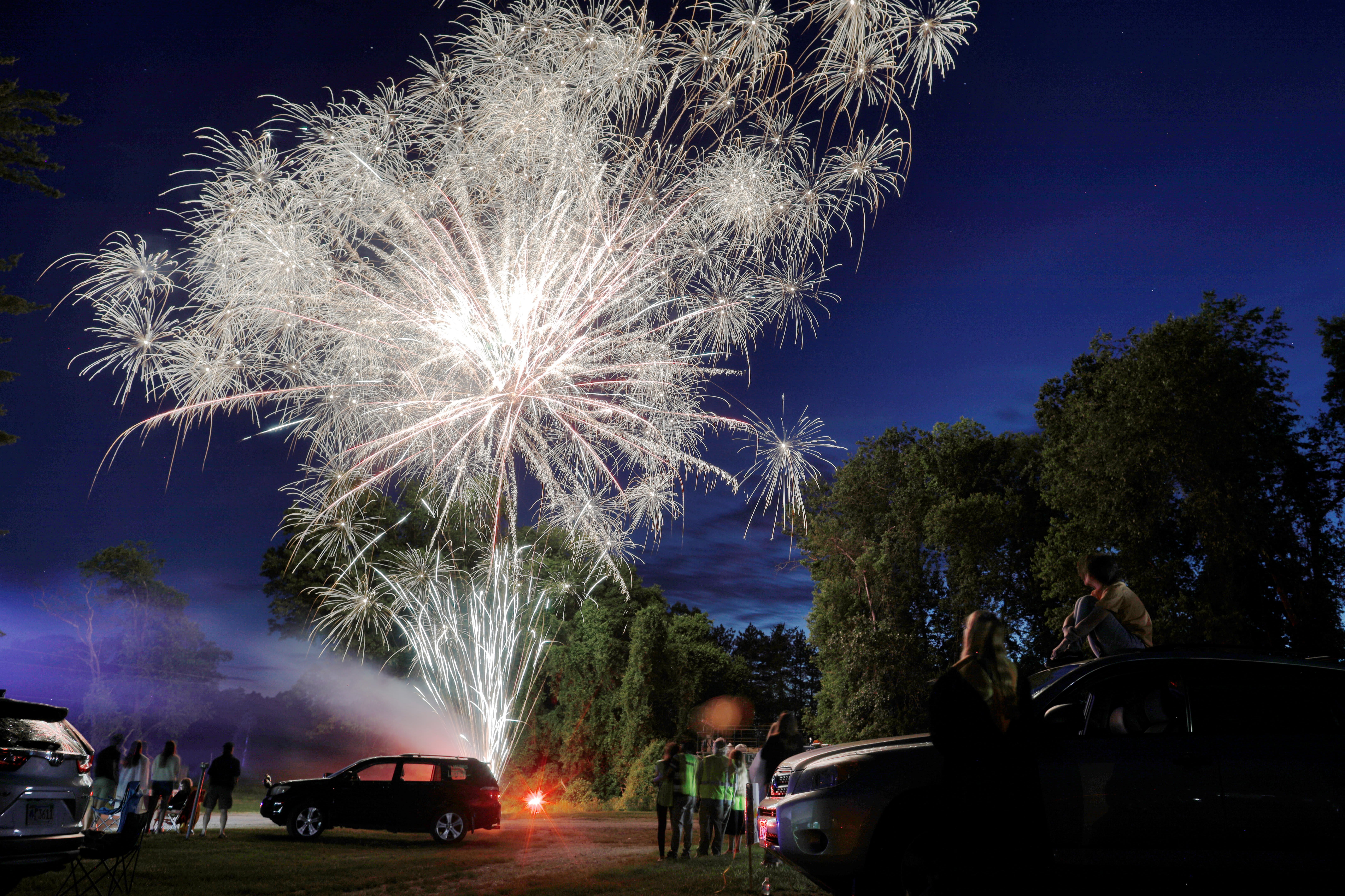Image: High school graduation is held at a drive-in theater due to the outbreak of the coronavirus disease (COVID-19) in Hinsdale