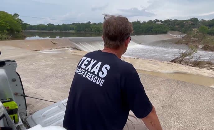 As a volunteer for TEXSAR, Jonathan McComb has spent the last four days alongside thousands of others working from dawn until dusk to clear mountains of debris that stretch for miles across Kerr County.