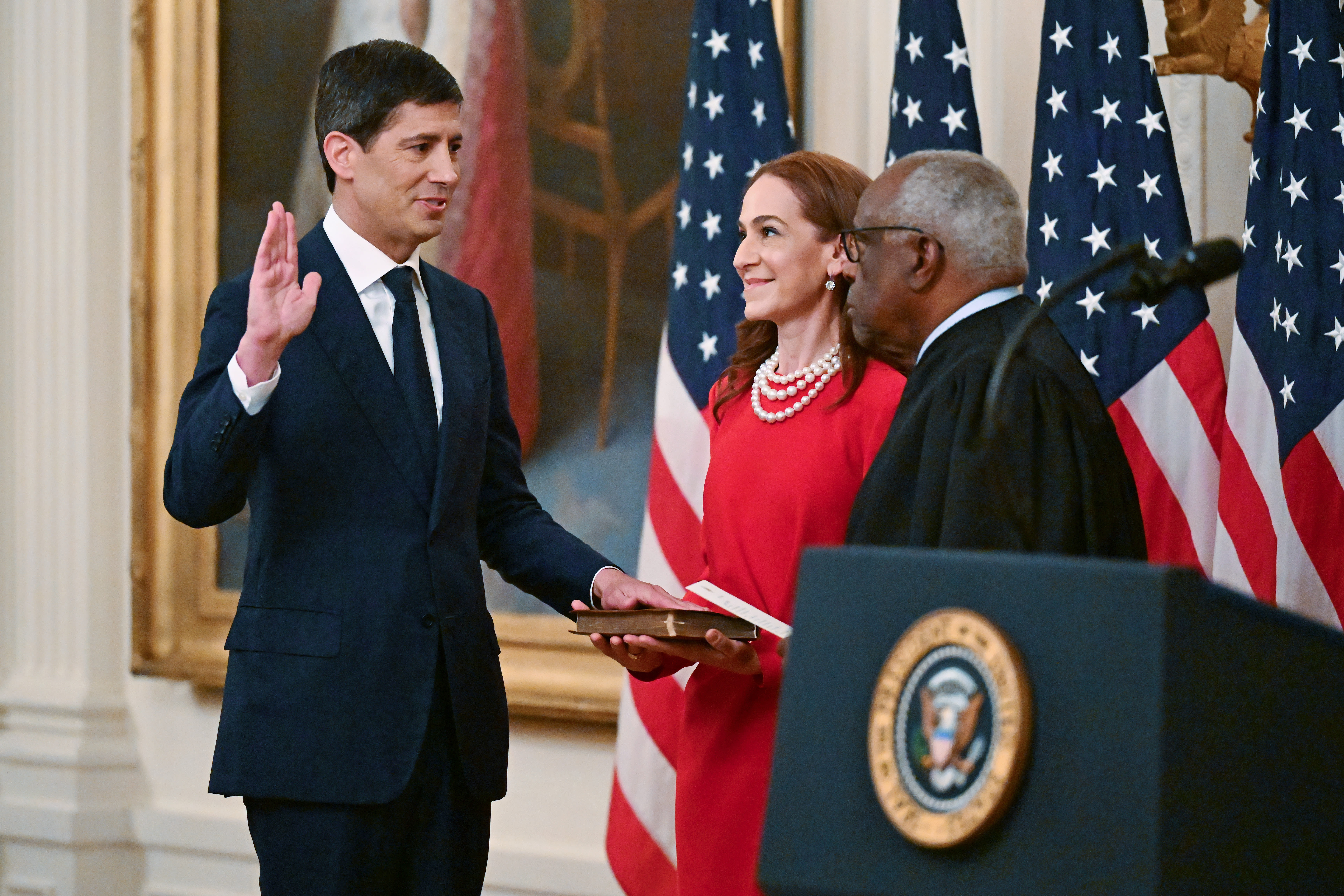 Kevin Warsh takes the oath of office from Supreme Court Associate Justice Clarence Thomas
