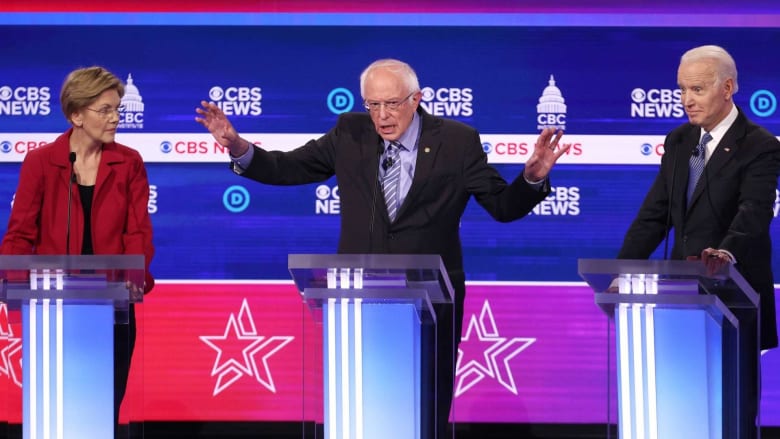 Sanders, Bloomberg take fire in chaotic, loud debate