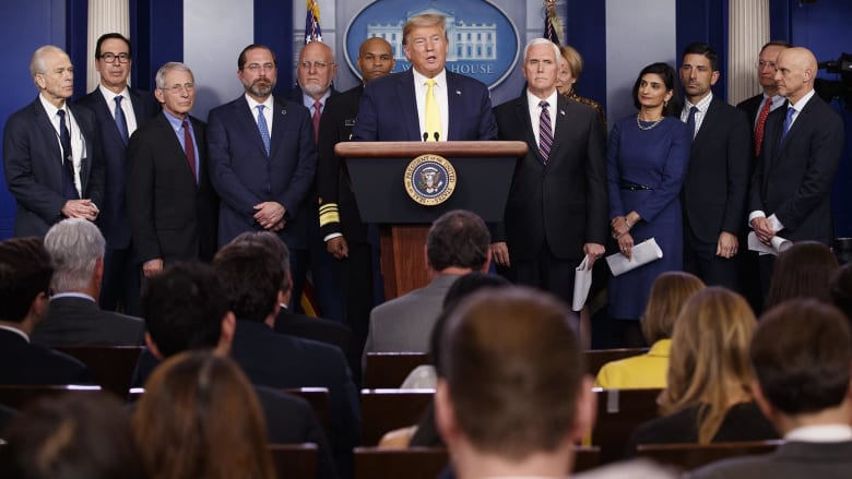 White House gives mixed messages on coronavirus response