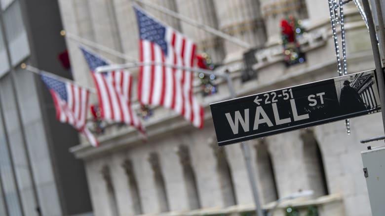 Despite interest rate cut, stocks plunge and trading is halted