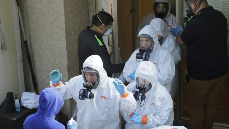 Video time-lapse shows cleaning crew’s long exit from facility with COVID-19
