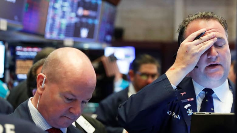 Dow closes at 1,300 point loss despite White House trillion-dollar stimulus plan