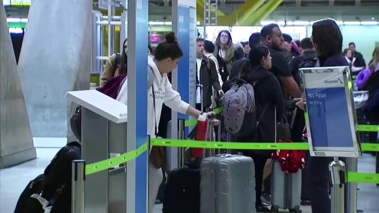 Anxious travelers rushing home to US amid travel ban