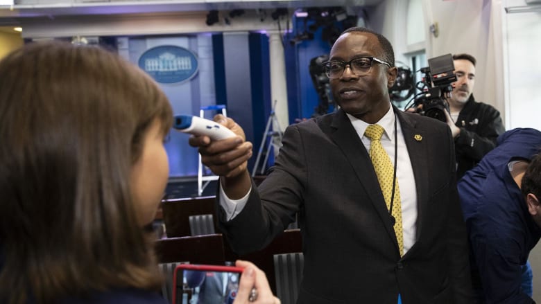 Watch reporters get their temperature taken at the White House