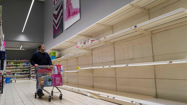 France residents empty grocery store shelves to prepare for coronavirus lockdown