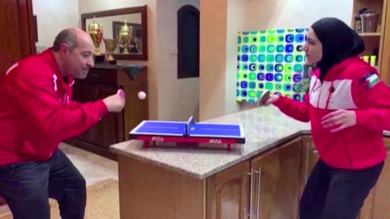 Table tennis-playing family finds creative way to beat COVID-19 quarantine