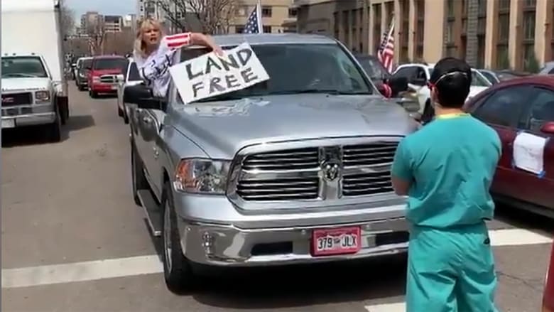 Video shows nurse facing down Colorado protester against stay-at-home order