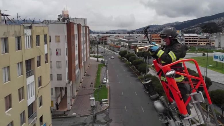 Firefighter entertains residents in coronavirus lockdown with high-rise fanfares