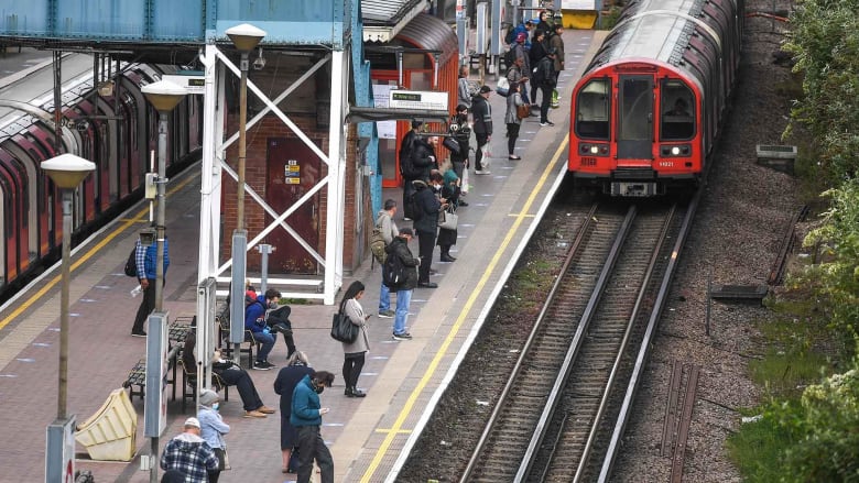 Gradual return to work in London after coronavirus lockdown tests transit system