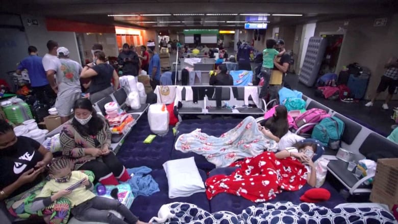 Hundreds of Colombians stranded inside airport by coronavirus lockdown