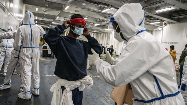 Migrants kept in coronavirus quarantine on board ferry boat