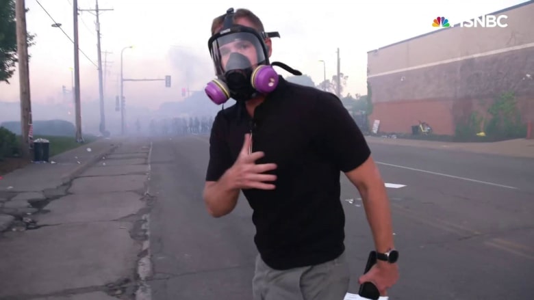 Flash-bangs go off near NBC News reporter as Minneapolis protesters retreat from tear gas