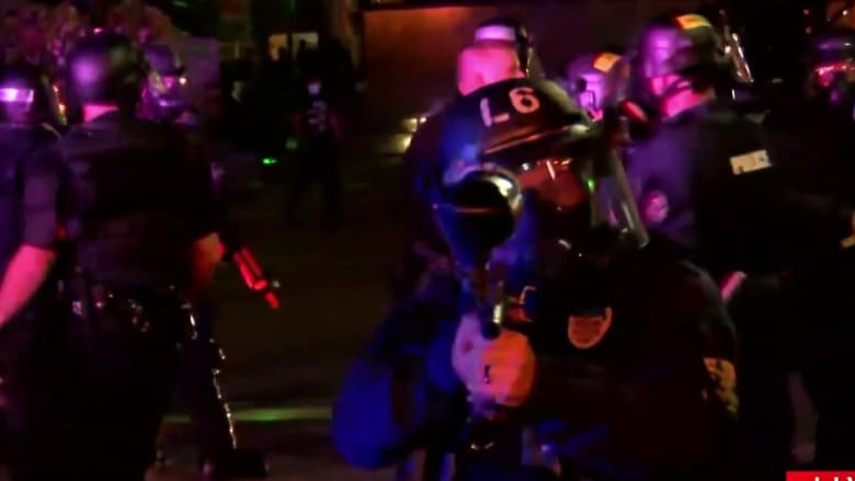 Louisville police fire pepper bullets at reporter and crew