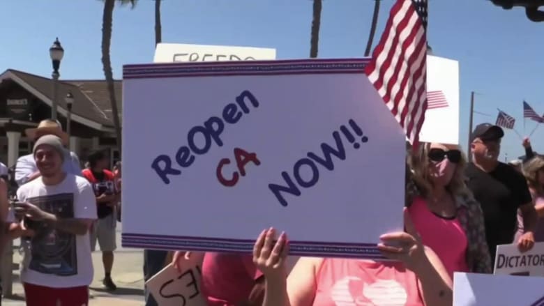 New protests demand states ease coronavirus restrictions