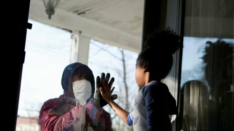 Americans divided over coronavirus pandemic stay-at-home orders