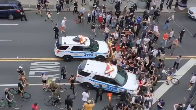 New York City police vehicles filmed driving into crowds of protestors
