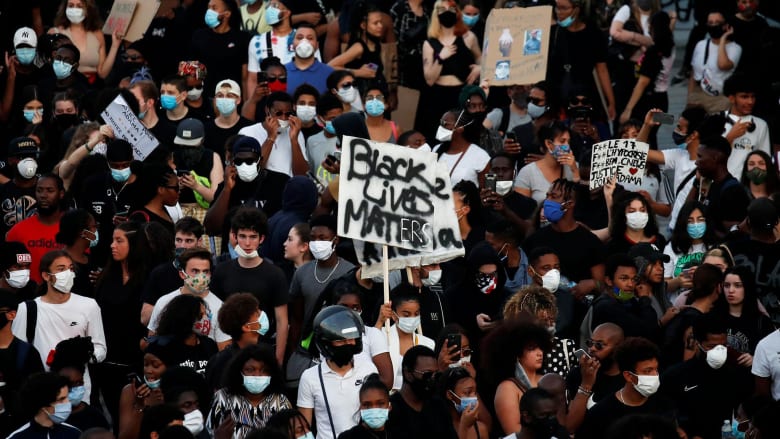 Thousands defy police ban to protest racial injustice in Paris