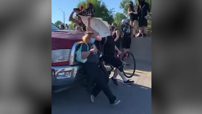 Video shows truck plowing into group of Oklahoma protesters