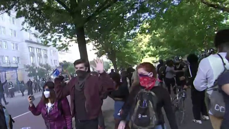 Peaceful protest outside White House broken up by police