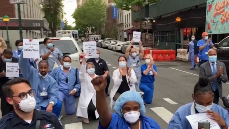 Health care workers on coronavirus front lines join protests against racial injustice
