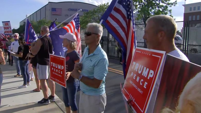 Protesters gather outside where Joe Biden will deliver his DNC speech