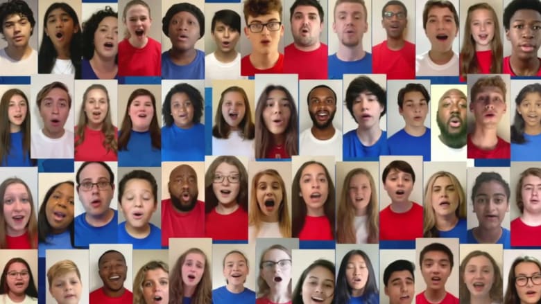 Watch singers from around the U.S. sing the national anthem to open the DNC