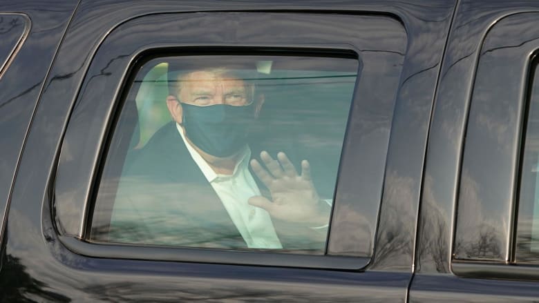 Watch: Trump waves at supporters in motorcade outside Walter Reed Hospital