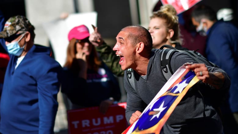 Watch Trump, Biden supporters stage competing protests outside counting center