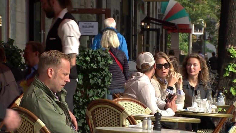 Sweden’s ‘no lockdown’ approach to pandemic under scrutiny as cases soar there