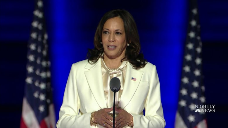 Young girls react as Vice President-elect Kamala Harris makes history
